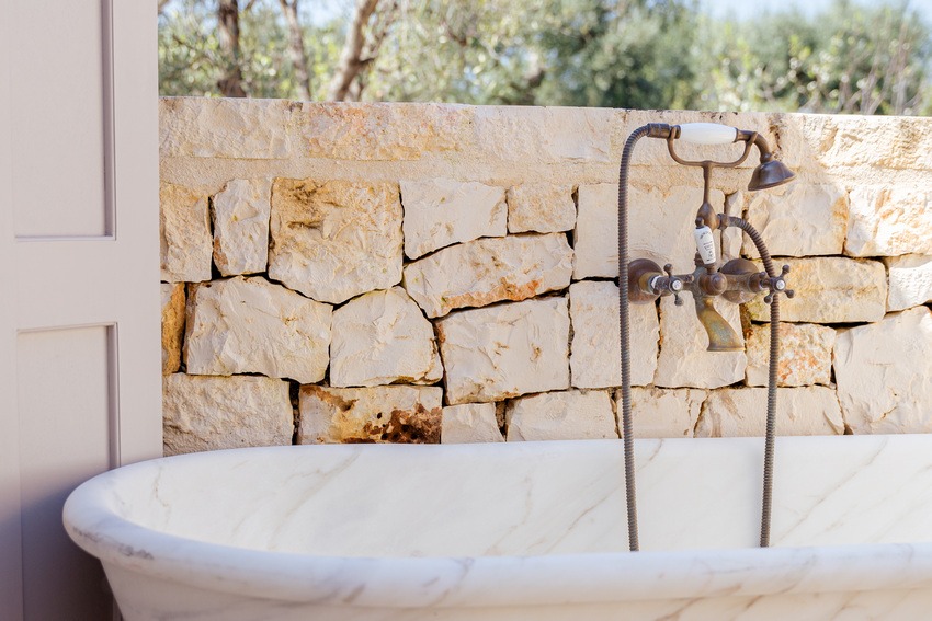 Trullo Petrarolo outdoor bathroom area with rustic elements