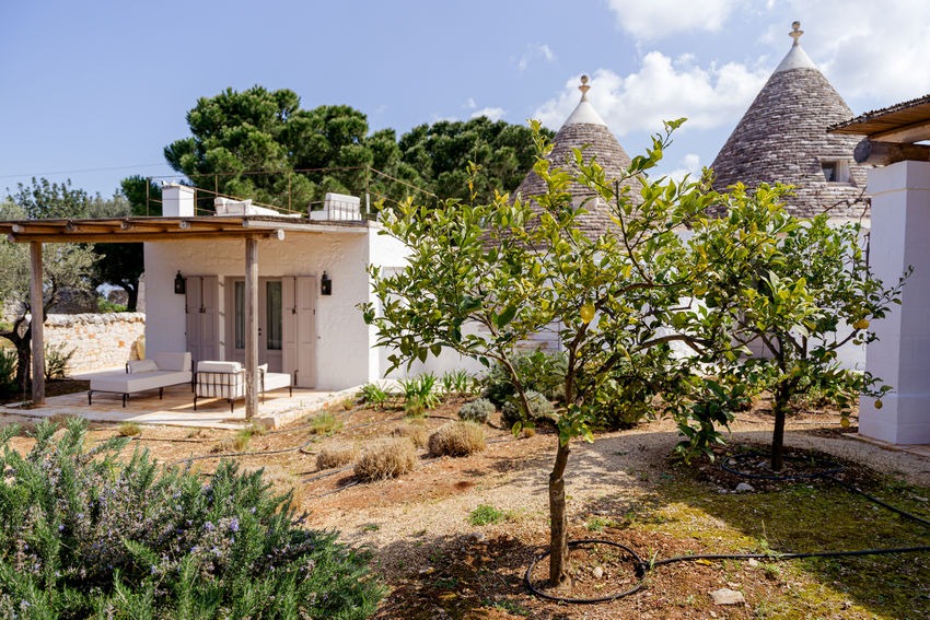 Trullo Petrarolo outdoor lounge area with countryside setting
