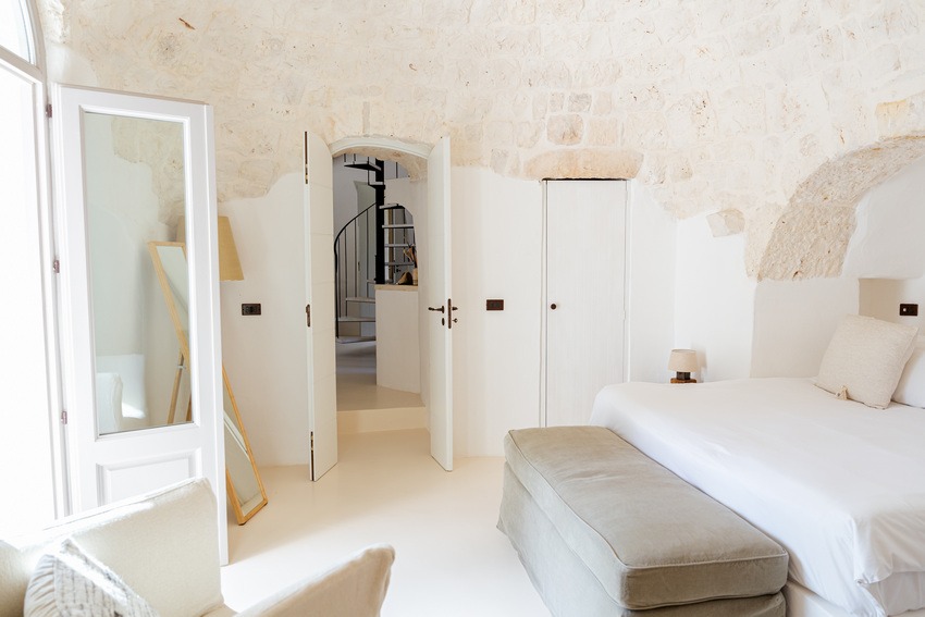 Trullo Petrarolo bedroom with elegant and minimal styling