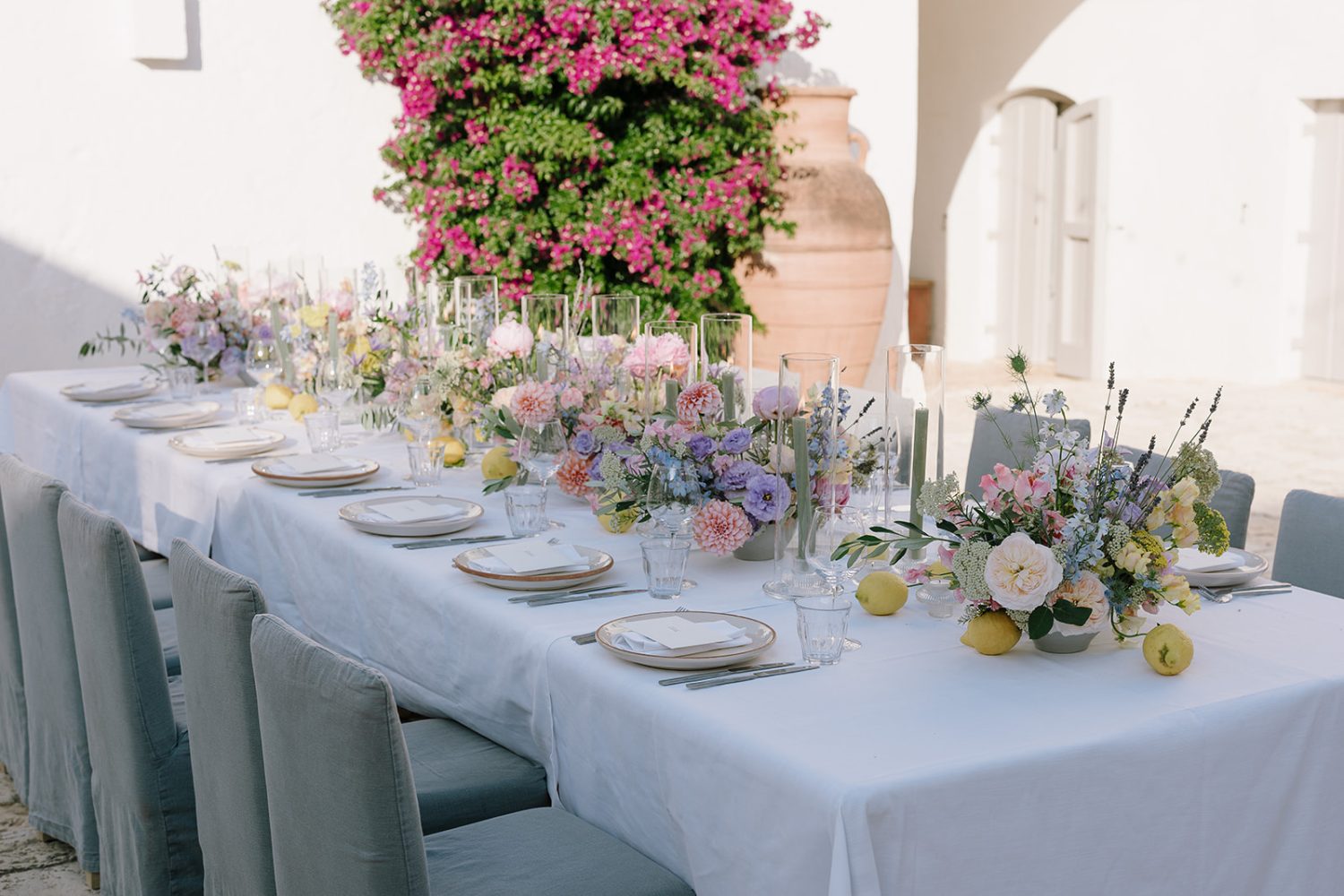 A beautifully set wedding table in the Petrarolo courtyard