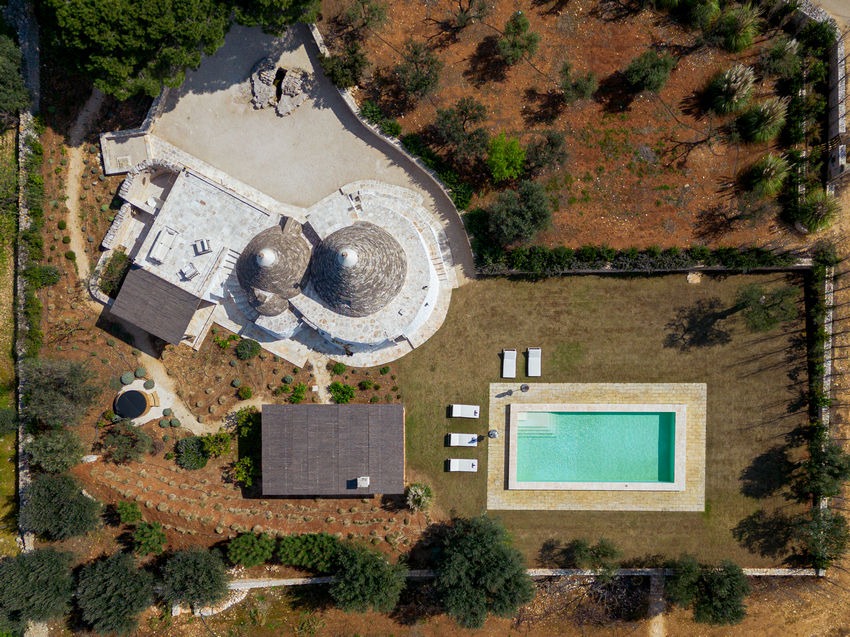 The private swimming pool at Trullo Petrarolo · 2